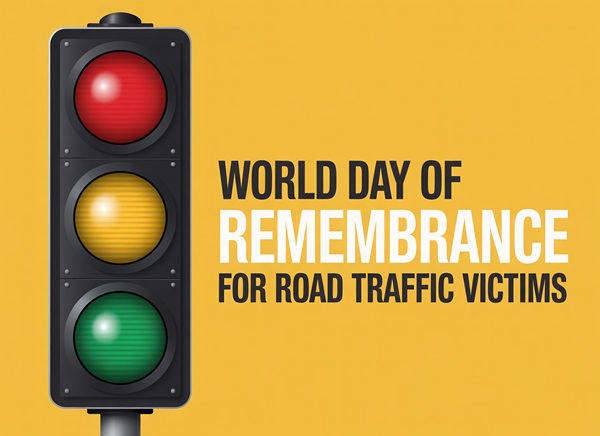  Here is the descriptive and concise alt text for this graphic: A traffic signal showing red, yellow, and green lights next to the text "WORLD DAY OF REMEMBRANCE FOR ROAD TRAFFIC VICTIMS" on a solid yellow background.