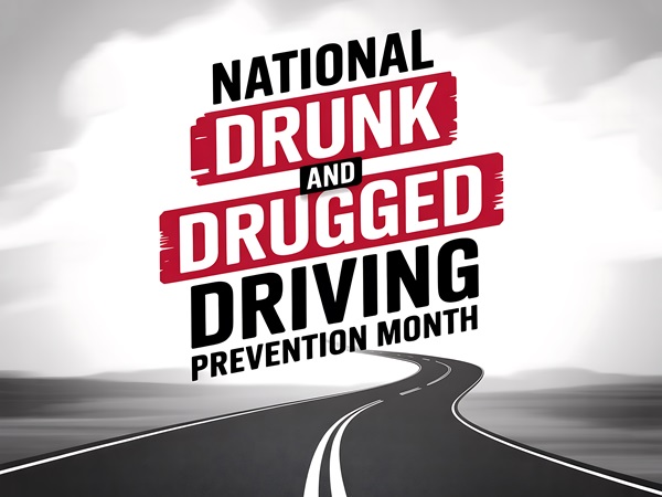 Bold text reading "National Drunk and Drugged Driving Prevention Month" overlays a black and white image of a winding two-lane road stretching toward a cloudy horizon.